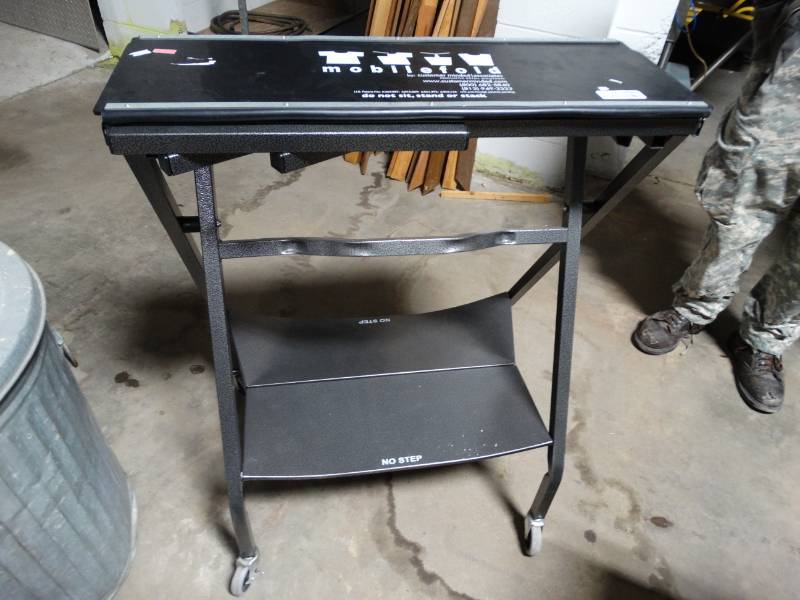 lot 8967 image: Mobilefold commercial retail clothing folder table on wheels