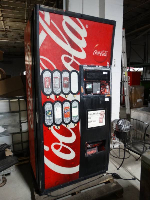lot 8979 image: Royal Vendors 8 select soda pop machine w dollar bill acceptor