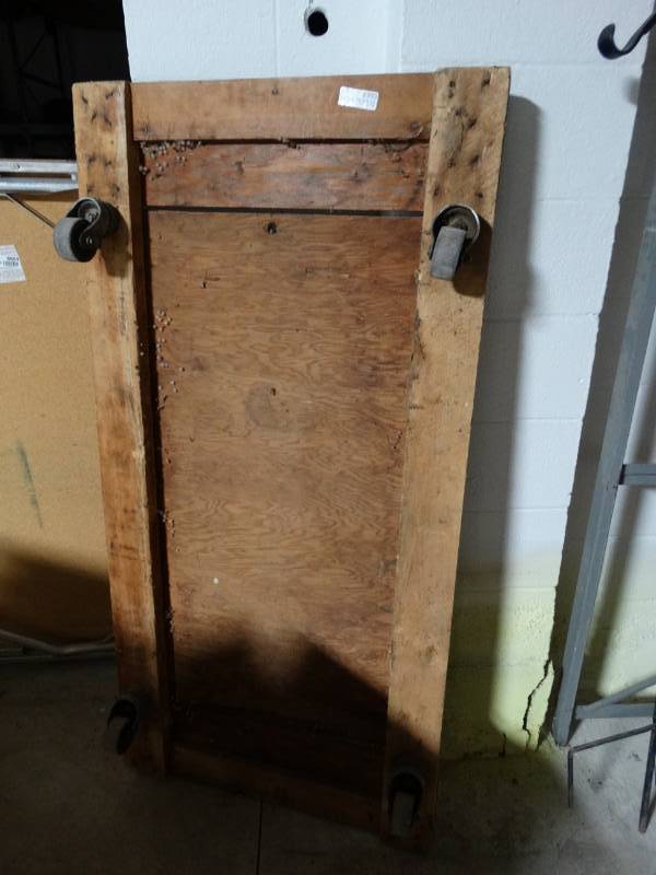 lot 8993 image: Lg moving cart on wheels- 30 x 60
