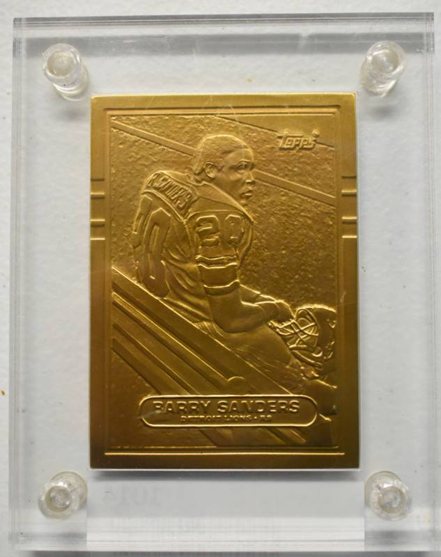 lot 1014 image: 1989 Topps Traded Barry Sanders Limited Edition Highland Mint Bronze Rookie Card
