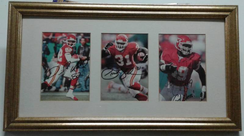 lot 1070 image: Gold Framed & Matted Kansas City Chiefs Signed Priest Holmes, Dante Hall, & Tony Richardson 3x5 Inches Photos