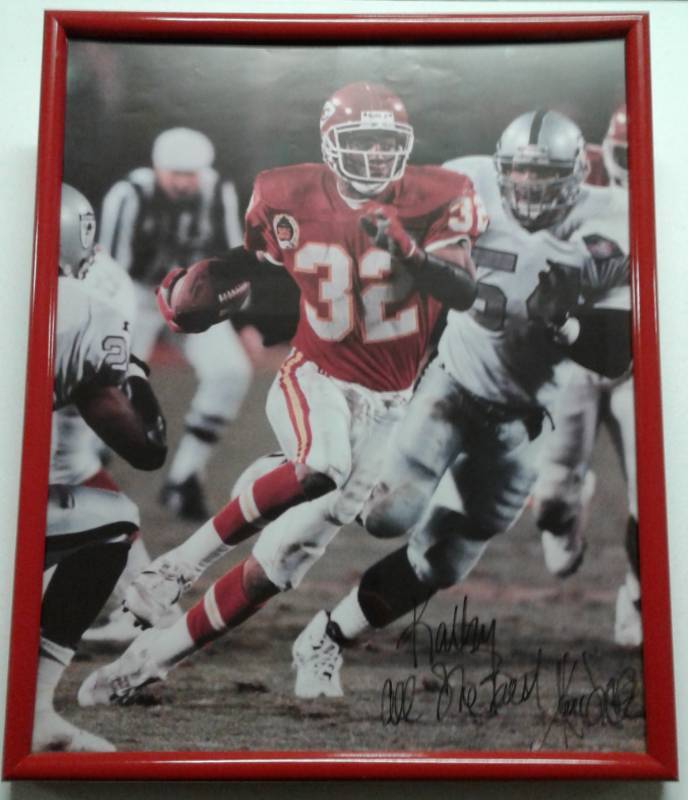 lot 1064 image: Large 16x20 Framed Marcus Allen Signed Photograph with Personalization Ready For Hanging
