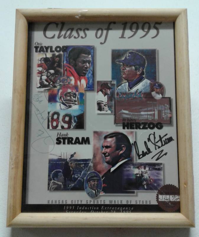 lot 1062 image: Official 1995 Kansas City Walk of Stars Limited Edition 8x10 inch Billcard Signed By Hank Stram & Otis Taylor - Framed Ready for Hanging