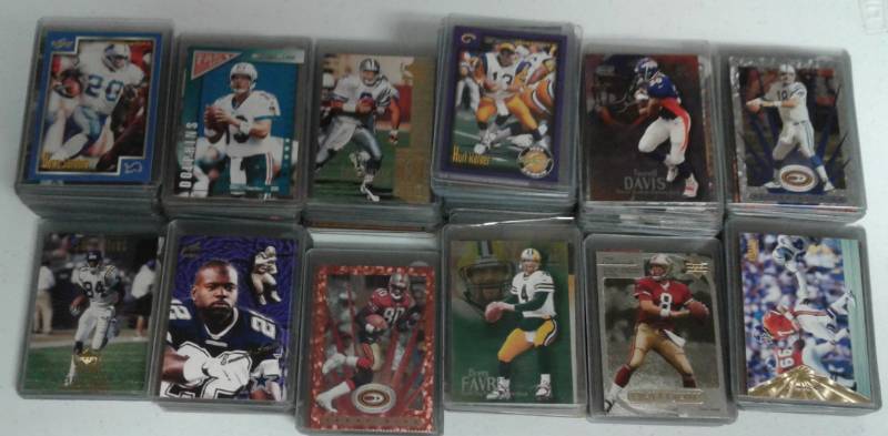 lot 1171 image: Great Collection of NFL Football Hall of Famer Football Cards Including Inserts & Rookies Elway, Marino, Manning, Aikman, Young, Emmitt, Barry Sanders, & More
