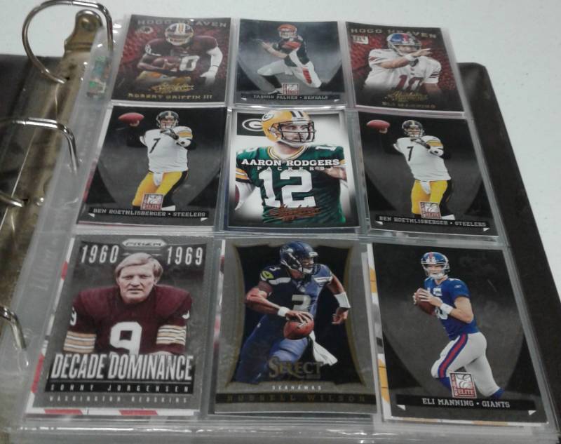 lot 1172 image: Huge Lot of over 250 Football Trading Cards in Pages ONLY Quarterbacks - Tom Brady, Aaron Rodgers, Manning, Roethlisberger, Andrew Luck, Russell Wilson, Rookies, Inserts & More