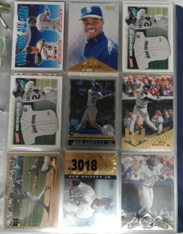 lot 1173 image: Binder Full of Hall of Fame Baseball Player Cards Including Ken Griffey Jr, Cal Ripken Jr, Greg Maddux, Barry Bonds & More