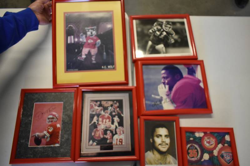 lot 1073 image: Collection of Seven Framed Kansas City Chiefs PIctures & Autographs - Montana, KC Wolf, Others