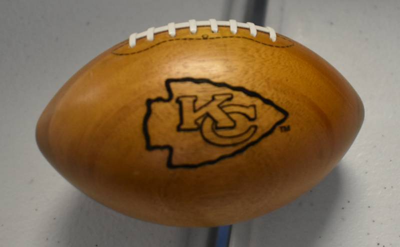 lot 1098 image: Kansas City Chiefs National Football League Wooden Team Logo Football - 5 Inches Wide