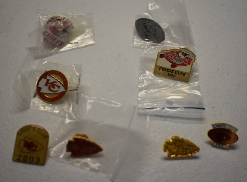 lot 1101 image: Collection of Eight Kansas City Chiefs Lapel Pins - All Different Years Chiefs Club PIns