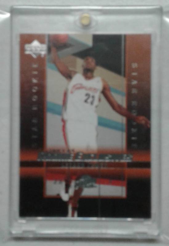 lot 1189 image: 2003-04 Upper Deck Exclusives LeBron James Rookie Card #1 in Magnetic Holder
