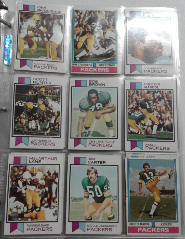 lot 1200 image: Binder Full of 1970s Football Cards with Staubach, Payton, Chiefs, and More Hall of Famers w Tons of Pictures