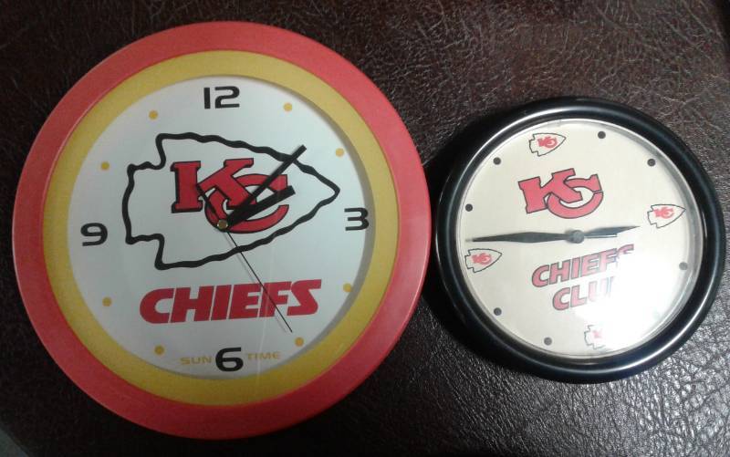 lot 1076 image: Two Kansas City Chiefs Hanging Wall Clocks - Mid 90s - Both Working from Chiefs Club