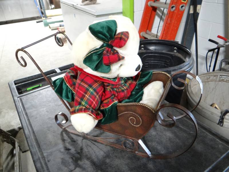 lot 5623 image: Metal sled decor with stuffed animal bear.