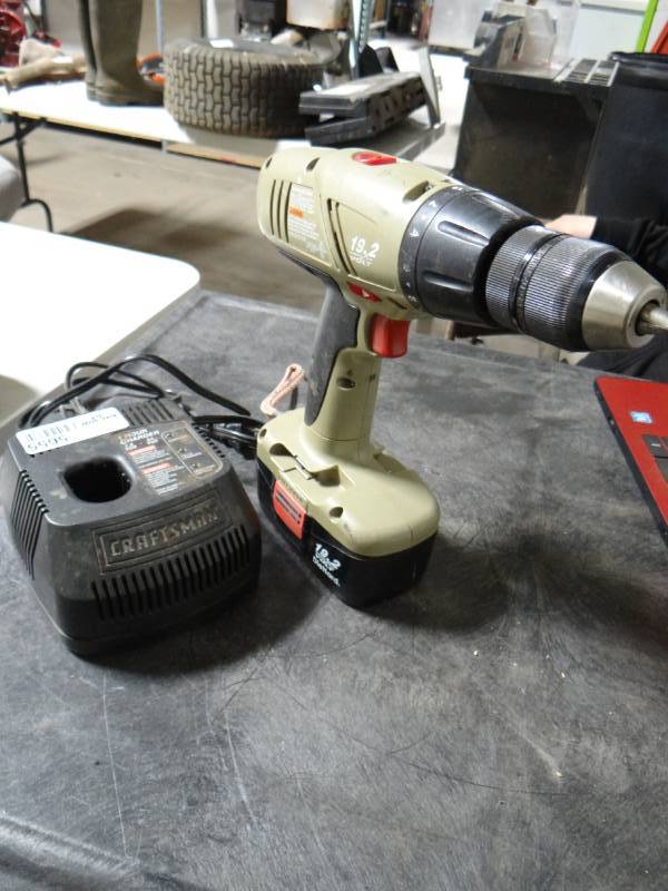 lot 5655 image: Craftsman 19.2 Volt die hard drill with battery charger.