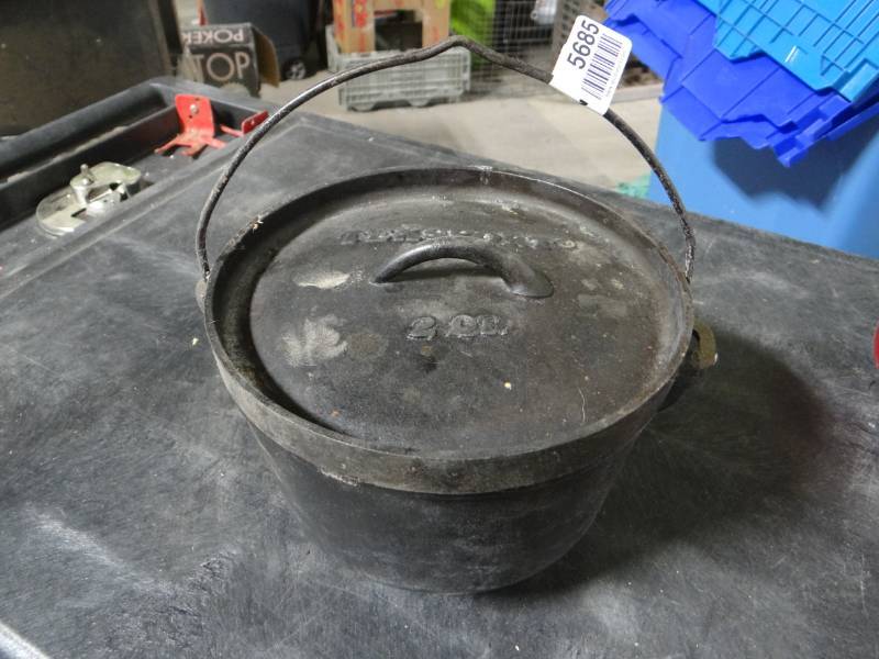 lot 5685 image: Texsport 2QT cast iron pot.
