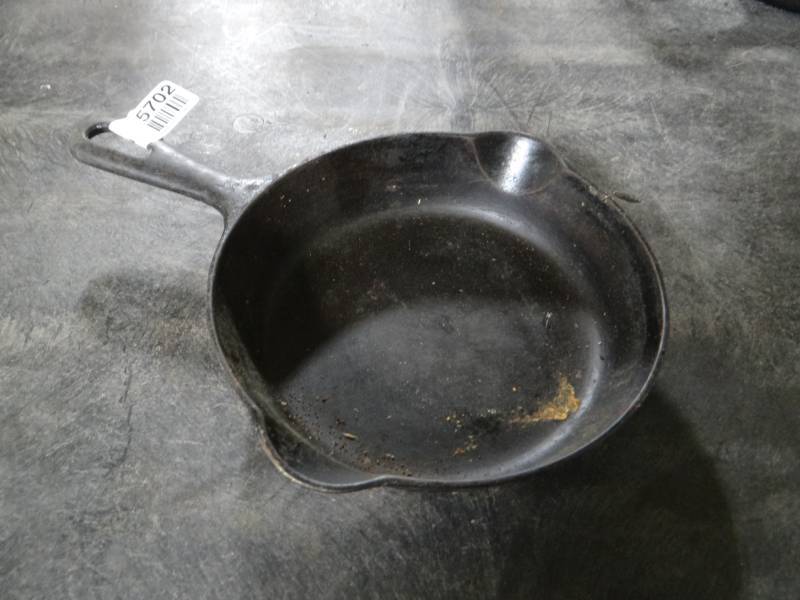 lot 5702 image: 7 Griswold cast iron pan.