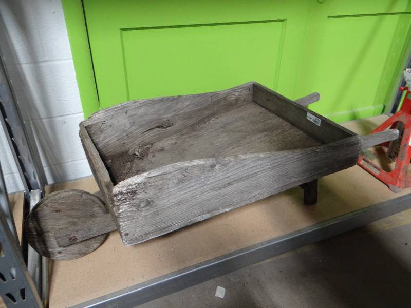 lot 5730 image: Wood wheel barrow yard decor.