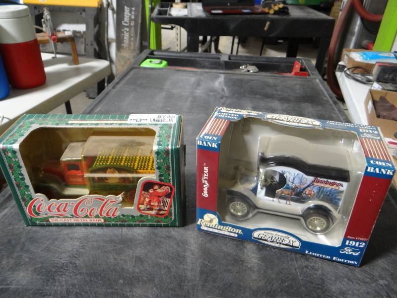 lot 5735 image: Coca cola die cast truck bank, & Remington die cast truck bank.