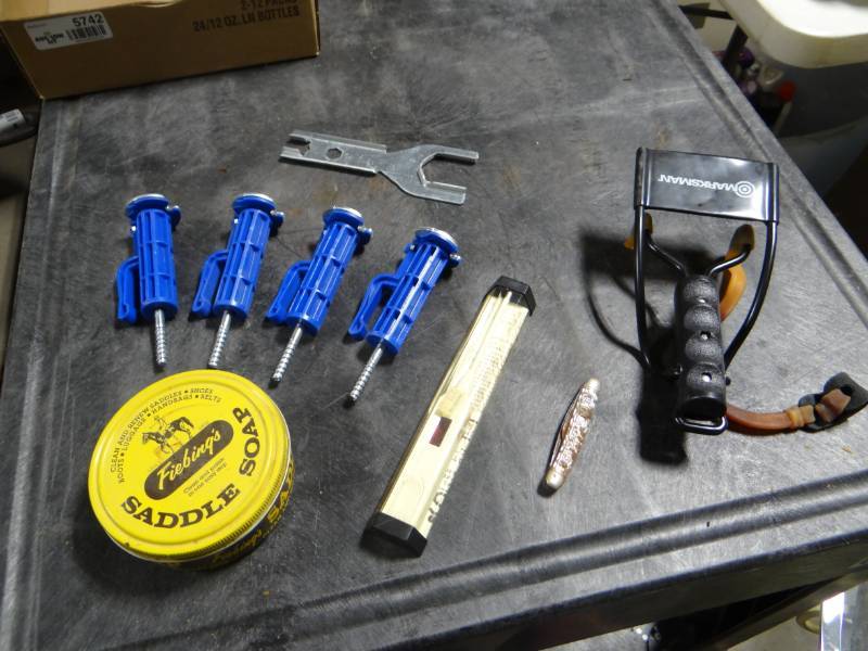 lot 5742 image: Broken slingshot,thermometer, & hardware.