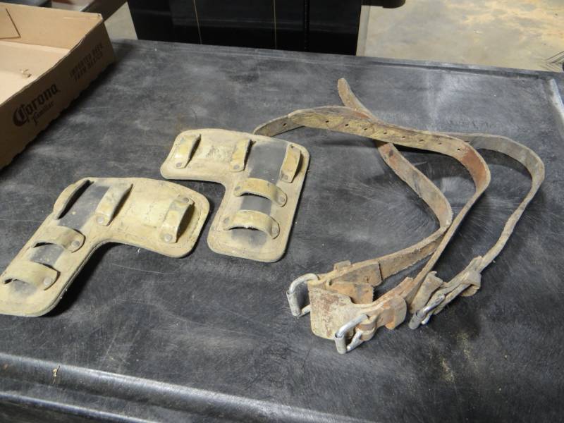 lot 5749 image: Leather belts and tool holders.