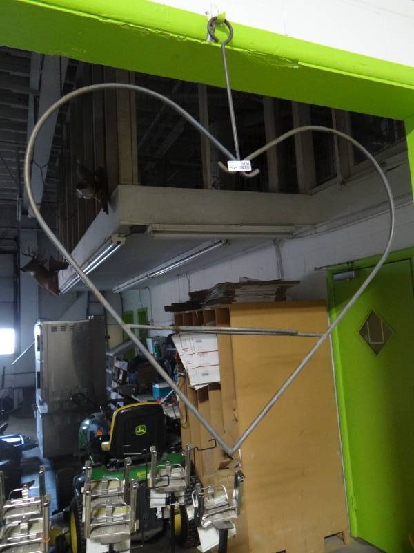 lot 5767 image: Metal heart shaped plant holder.