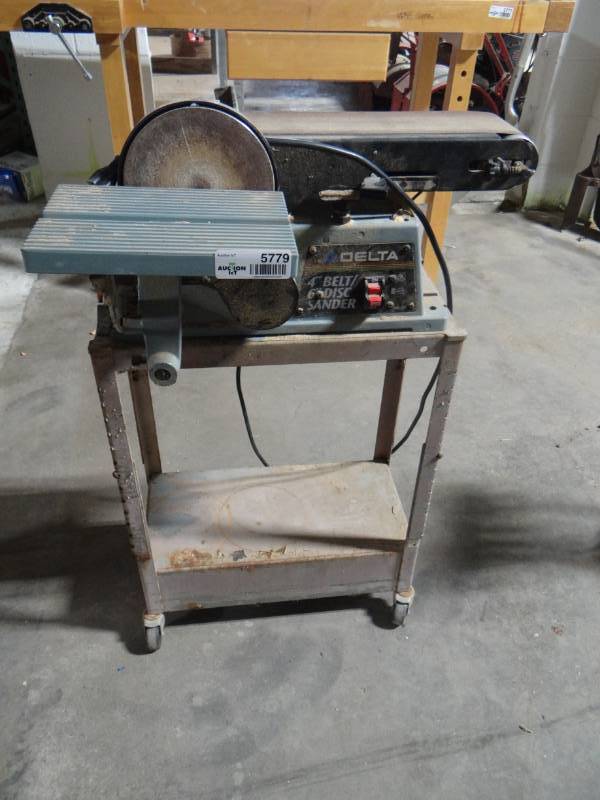lot 5779 image: Delta 4 belt 6 disk sander on stand with wheels, Works.