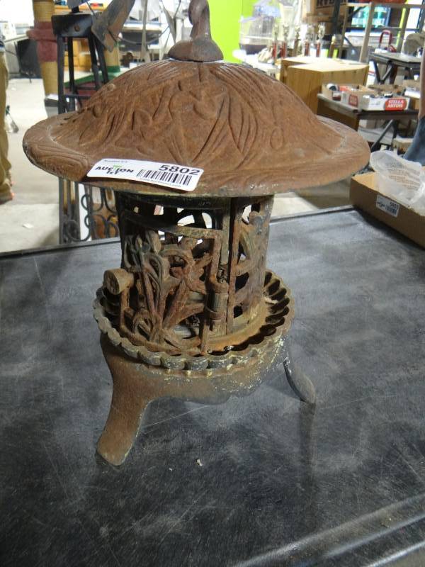 lot 5802 image: Vintage cast iron hanging lanttern candle holder.