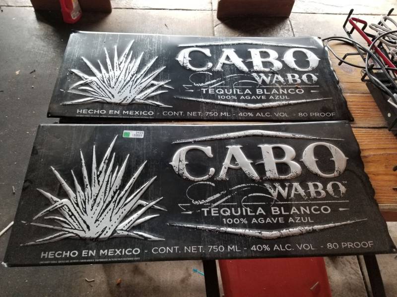 lot 3425 image: Cabo Wabo Metal Tequila Signs (2)
