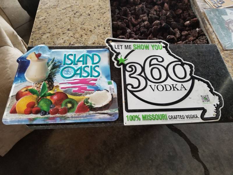 lot 3430 image: Island Oasis and 360 Vodka Metal Signs