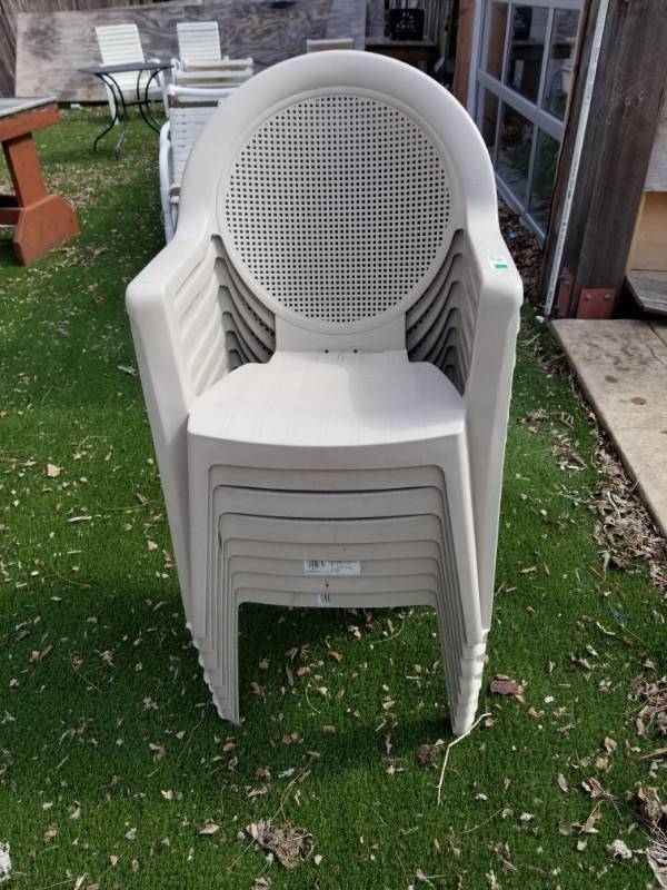 lot 3448 image: 8 Beige Plastic Patio Chairs
