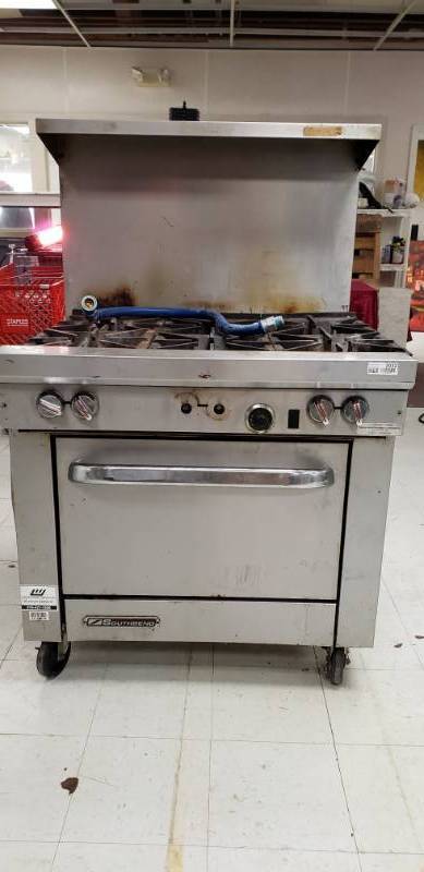 lot 2032 image: Southbend Commercial 6 Burner Gas Stove on Rollers