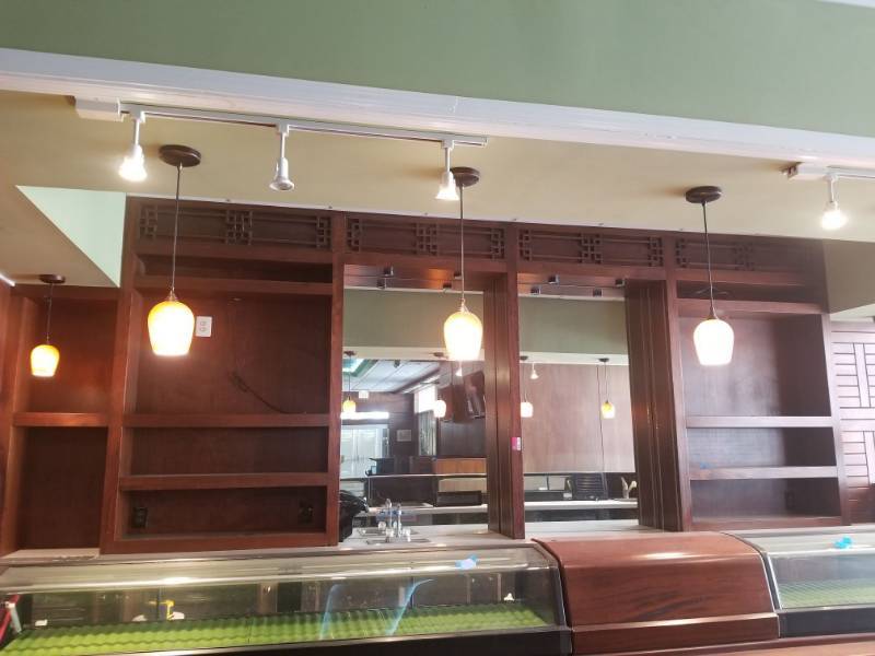 lot 1527 image: Upper Cabinets Behind Sushi Bar