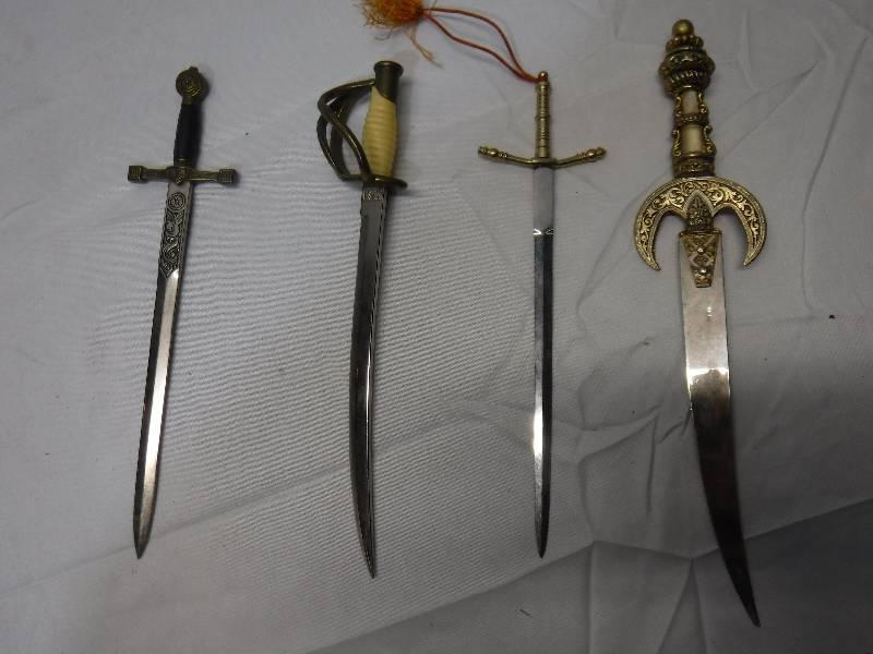 lot 1229 image: Sword looking letter openers- very cool