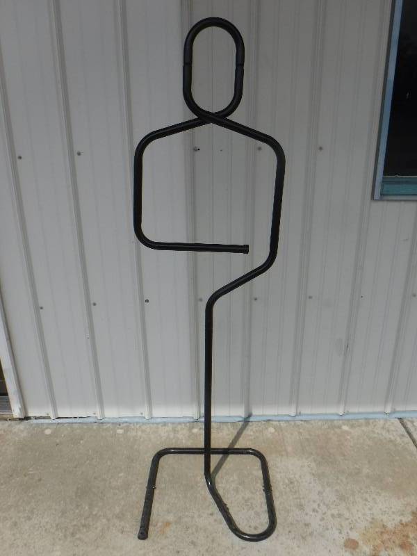 lot 1255 image: Wire garment holder shaped like a person