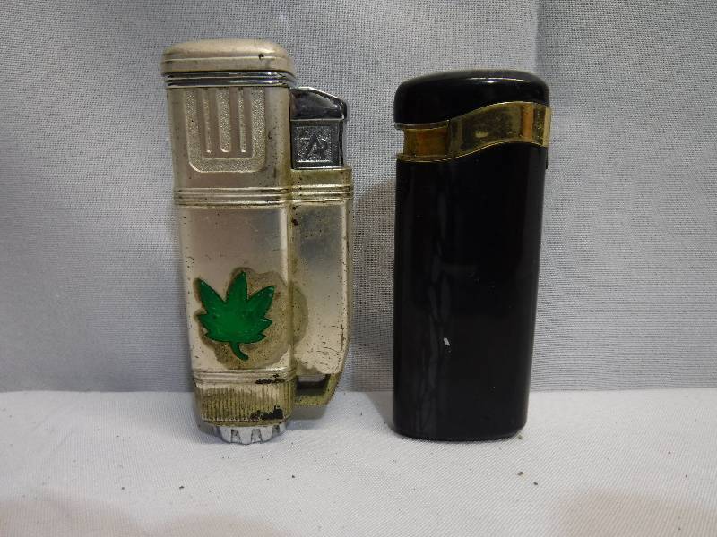 lot 1239 image: 2 torch style lighters