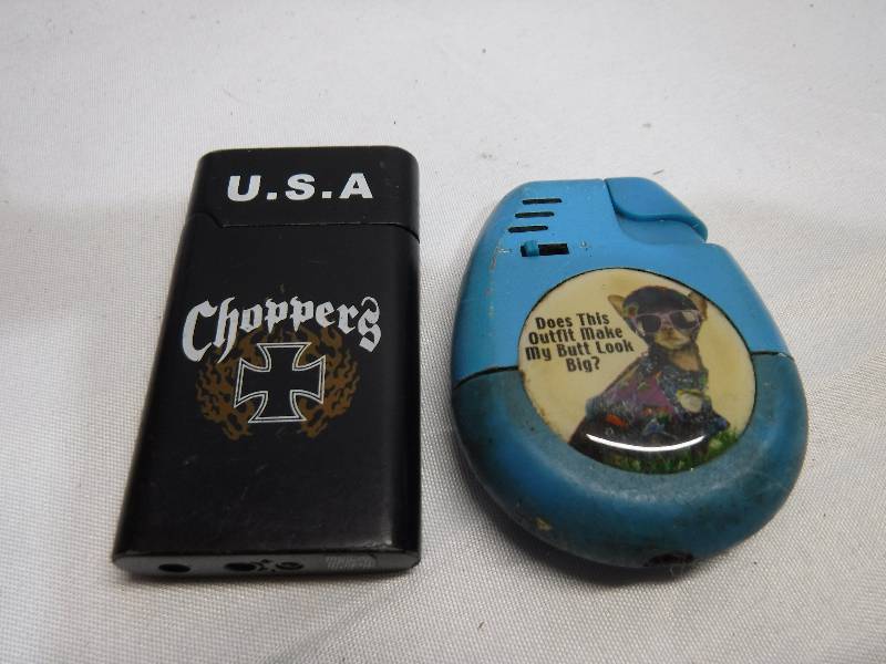lot 1243 image: USA Choppers and cat lighter