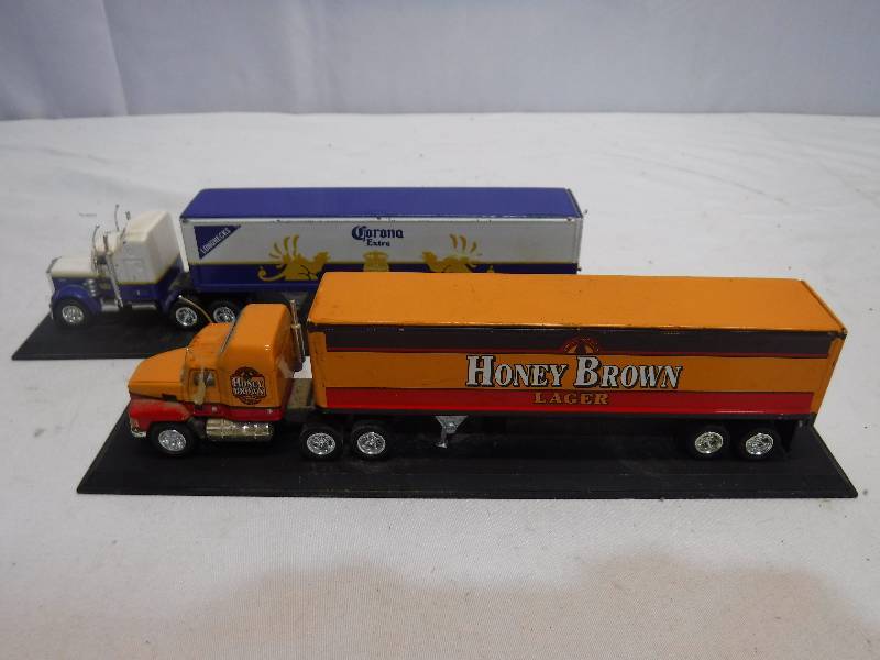 lot 1291 image: Corona and Honey Brown Beer truck toys