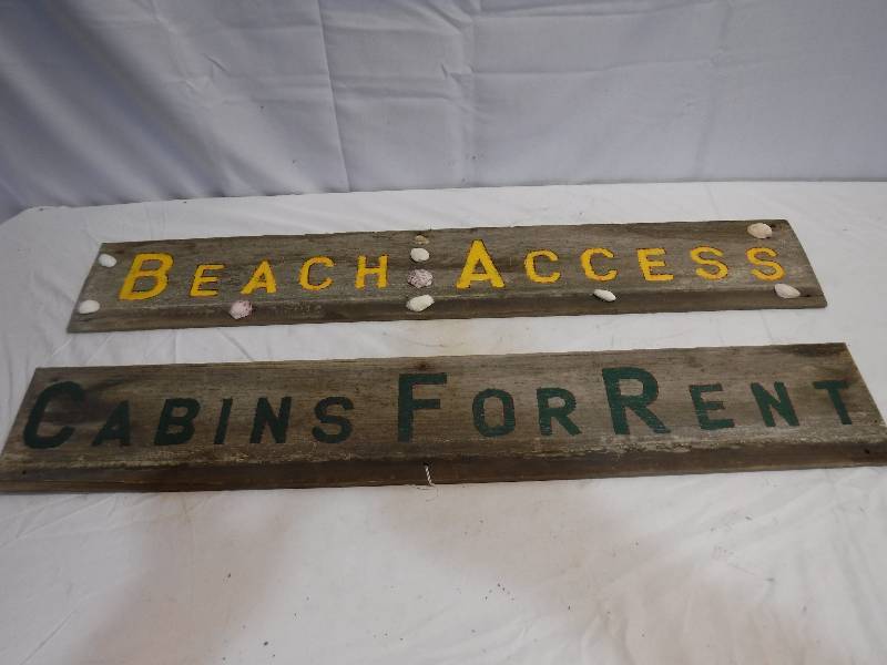 lot 1317 image: Beach access and cabins for rent wood signs