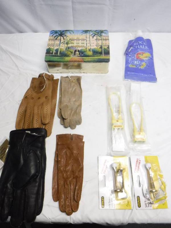 lot 1333 image: Misc lot, includes Jay Hawk item , puzzle and gloves