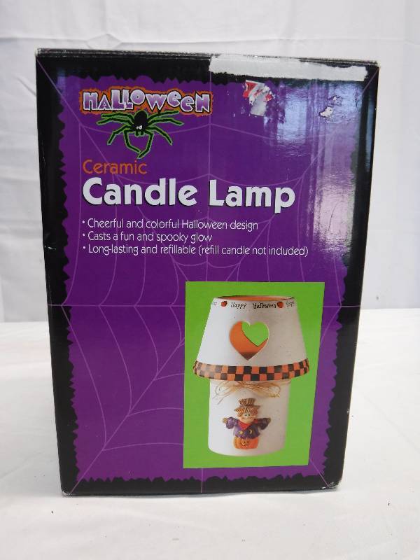 lot 1383 image: Scarecrow candle lamp