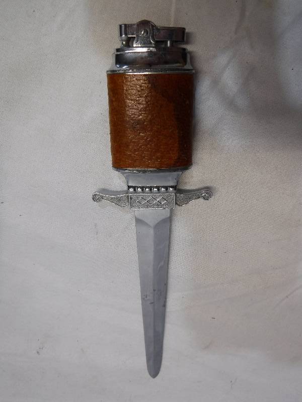 lot 1395 image: Letter opener lighter combo Unique
