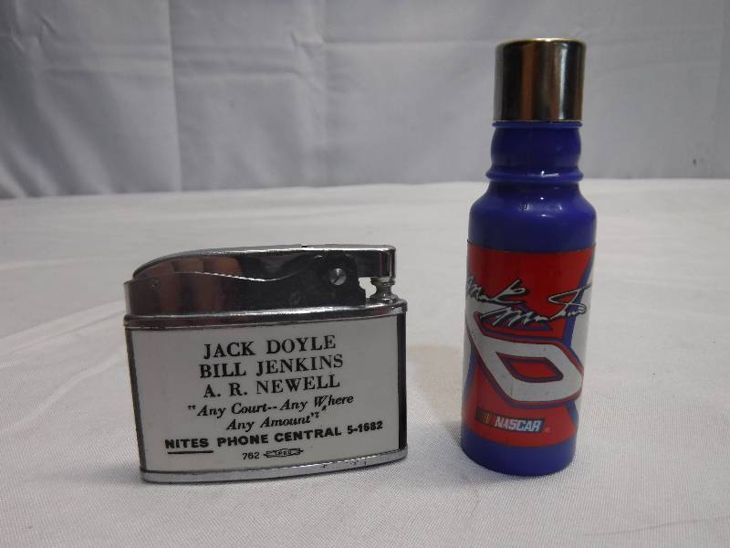 lot 1403 image: Advertising lighter and nascar lighter