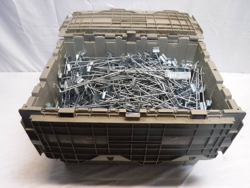 lot 1417 image: Tote full of peg board hooks, tote not included