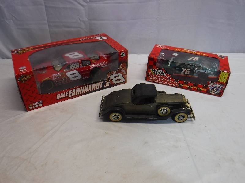 lot 1430 image: Dale Earnhardt Jr number 8 die cast car, Number 75 Nascar die cast car and 1931 model