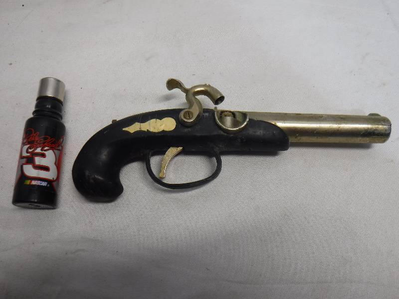 lot 1449 image: Flint lock pistol shaped lighter and dale jr lighter