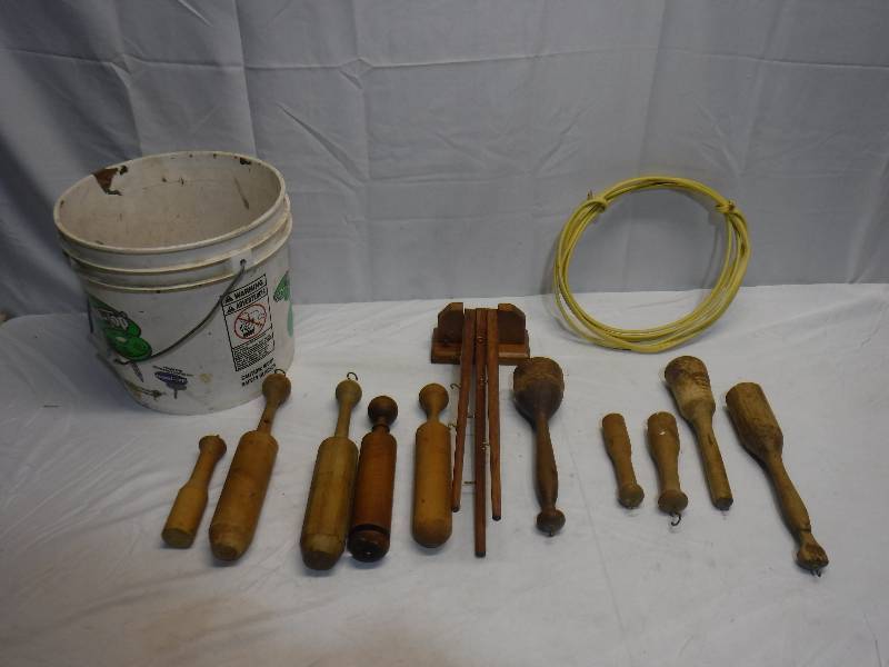 lot 1452 image: Wooden tools with hooks on them, bucket with roofing tabs and some wire