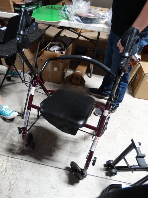 lot 19286 image: Medical rollator chair on wheels.