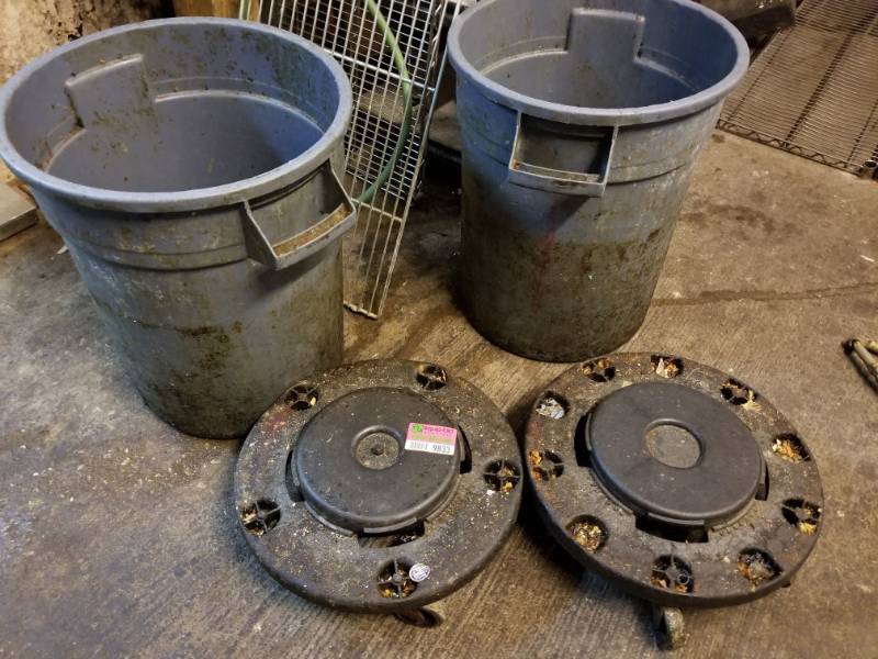 lot 9833 image: Two Trash Cans with Rolling Cart