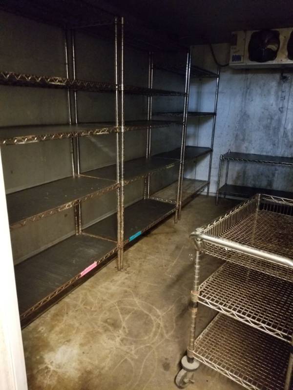 lot 9835 image: 7 Metro Racks and Rolling Cart Inside Walk In Cooler