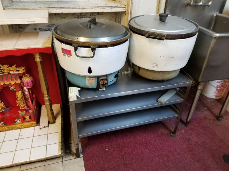 lot 9846 image: 2 Rice Cookers and Stainless Steel Table